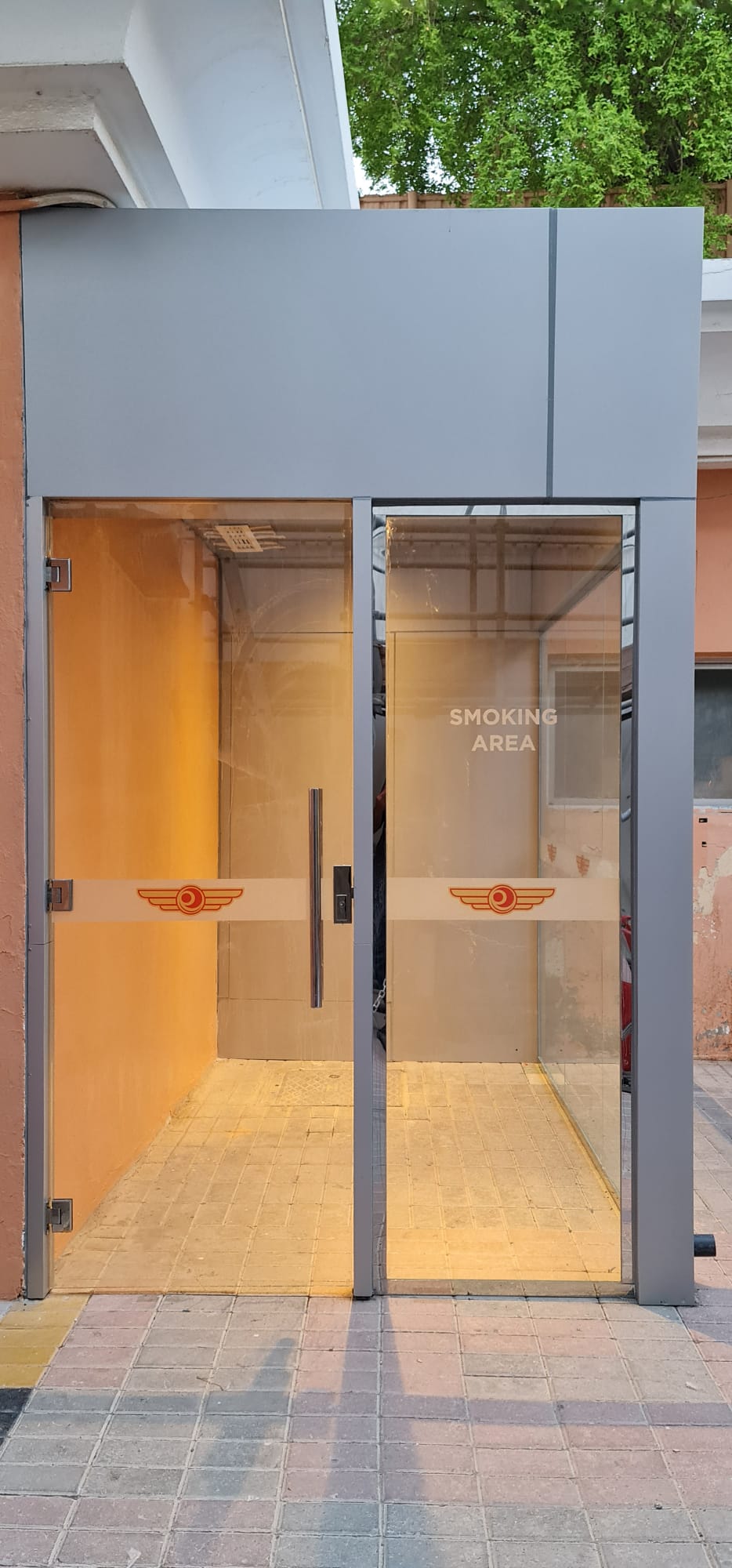 New glazed enclosure with branded manifestation
