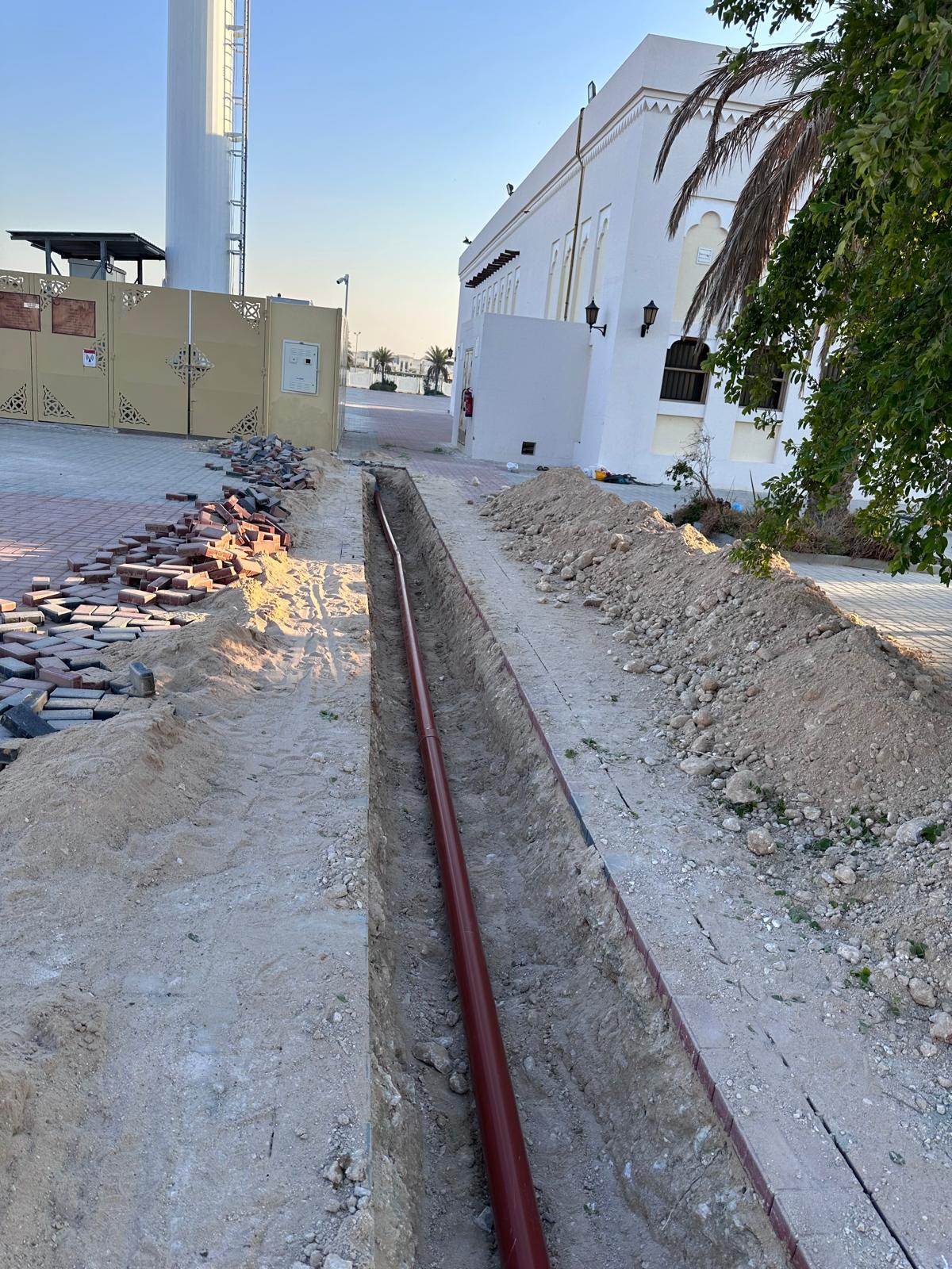 Ducted cable route laid in trench before backfill